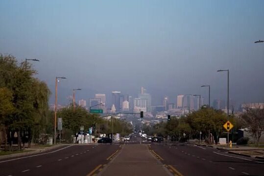 Air pollution is seen over a hazy downtown Phoenix on Jan 2020