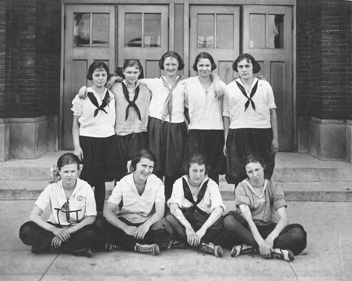 Mrs. Pulliam is pictured at the bottom left corner with her 1922 basketball team.